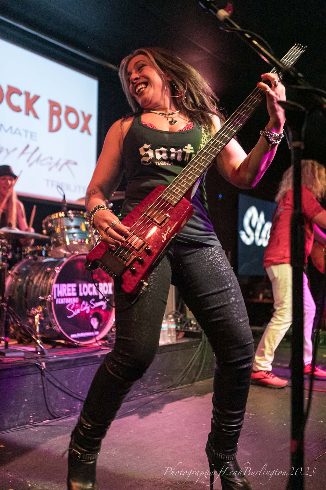 Merry Adin commanding the stage with her red bass