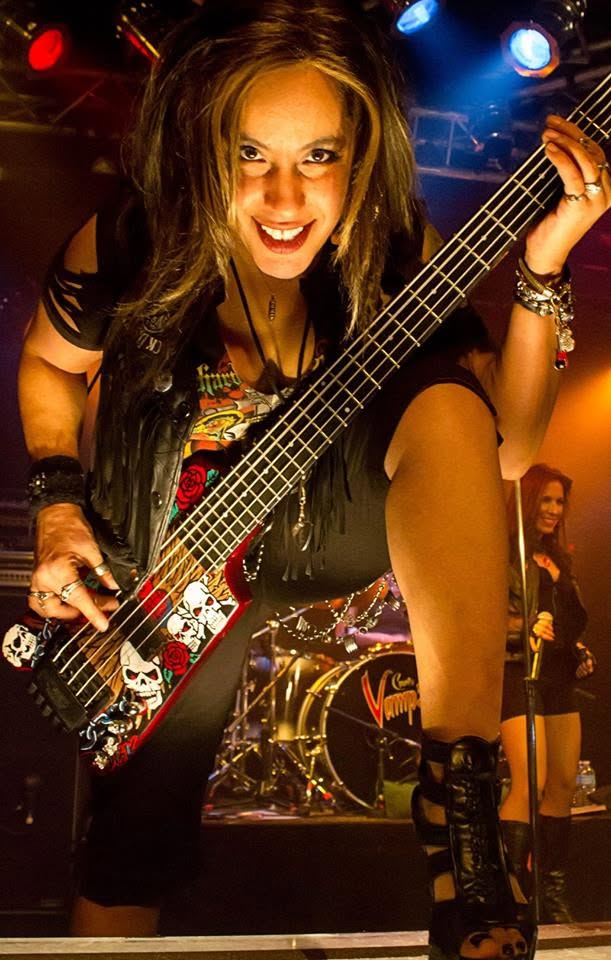 Merry Adin leaning into an energetic bass performance